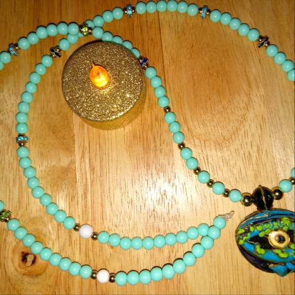 Protection eye emblem on a beaded  necklace - Picture 4 of 4